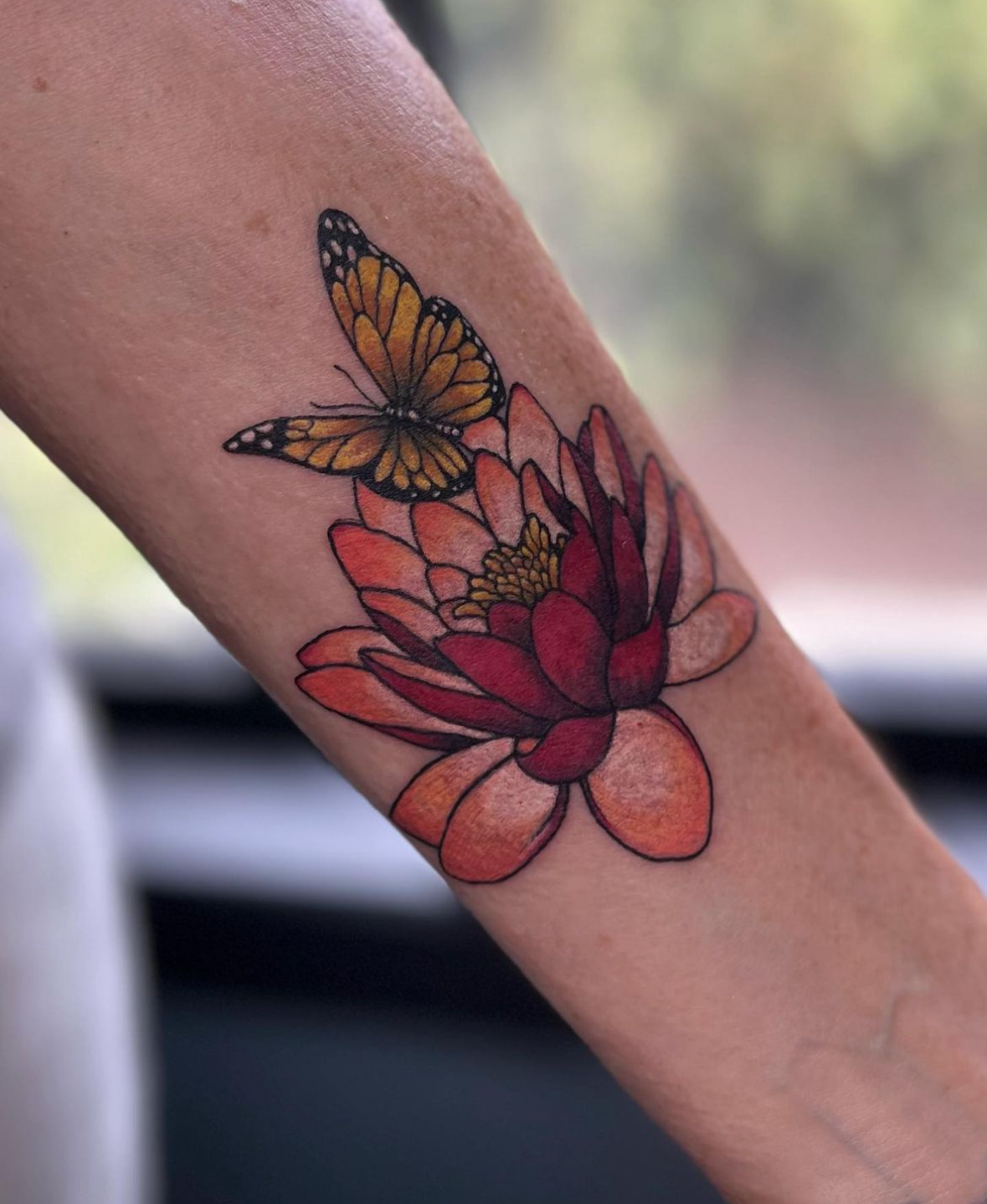 colorful lotus flower and butterfly tattoo.PNG