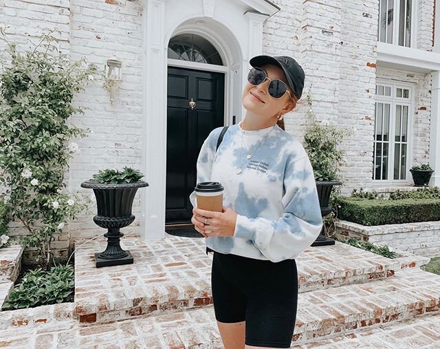 Just a girl in her cozy @summerfridays sweatshirt with a honey latte strolling down the cutest street 🤍✨🦋💫