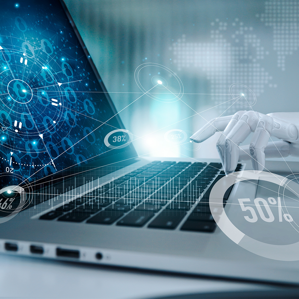 A robotic hand clicking on a laptop keyboard surrounded by futuristic digital graphics and data visualization elements.