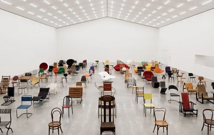 A collection of historic and modern chair designs illustrating the evolution of furniture, materials, construction, ergonomics, and aesthetics.