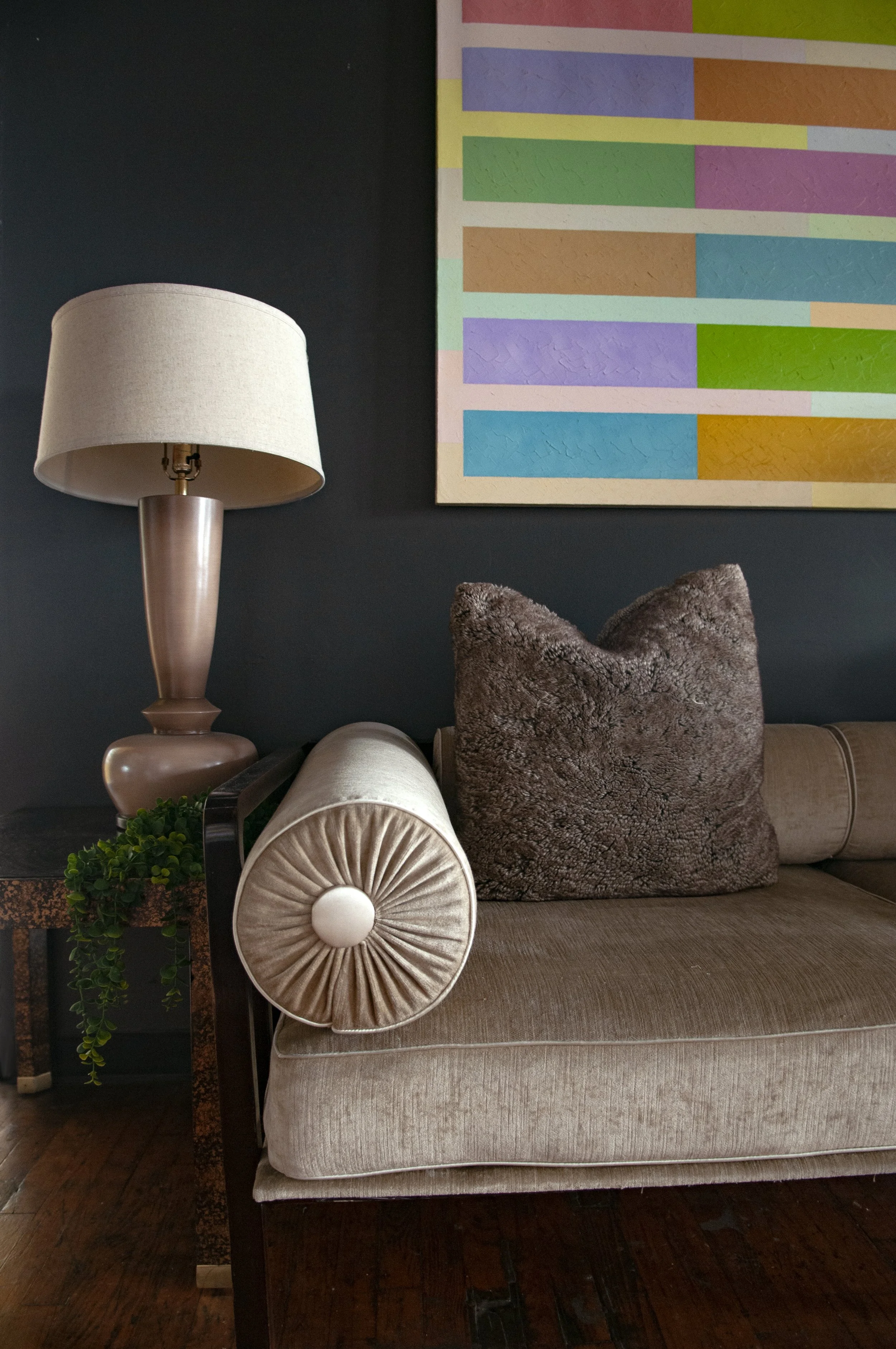 House of No Era's former historic loft studio in Camp Washington, Cincinnati, featuring a 1920s Lingel Art Deco daybed from Hungary, a faux-tortoise Henderdon smoked-glass side table, a Mocha sculptural Postmodern lamp, and an oversized color-field m
