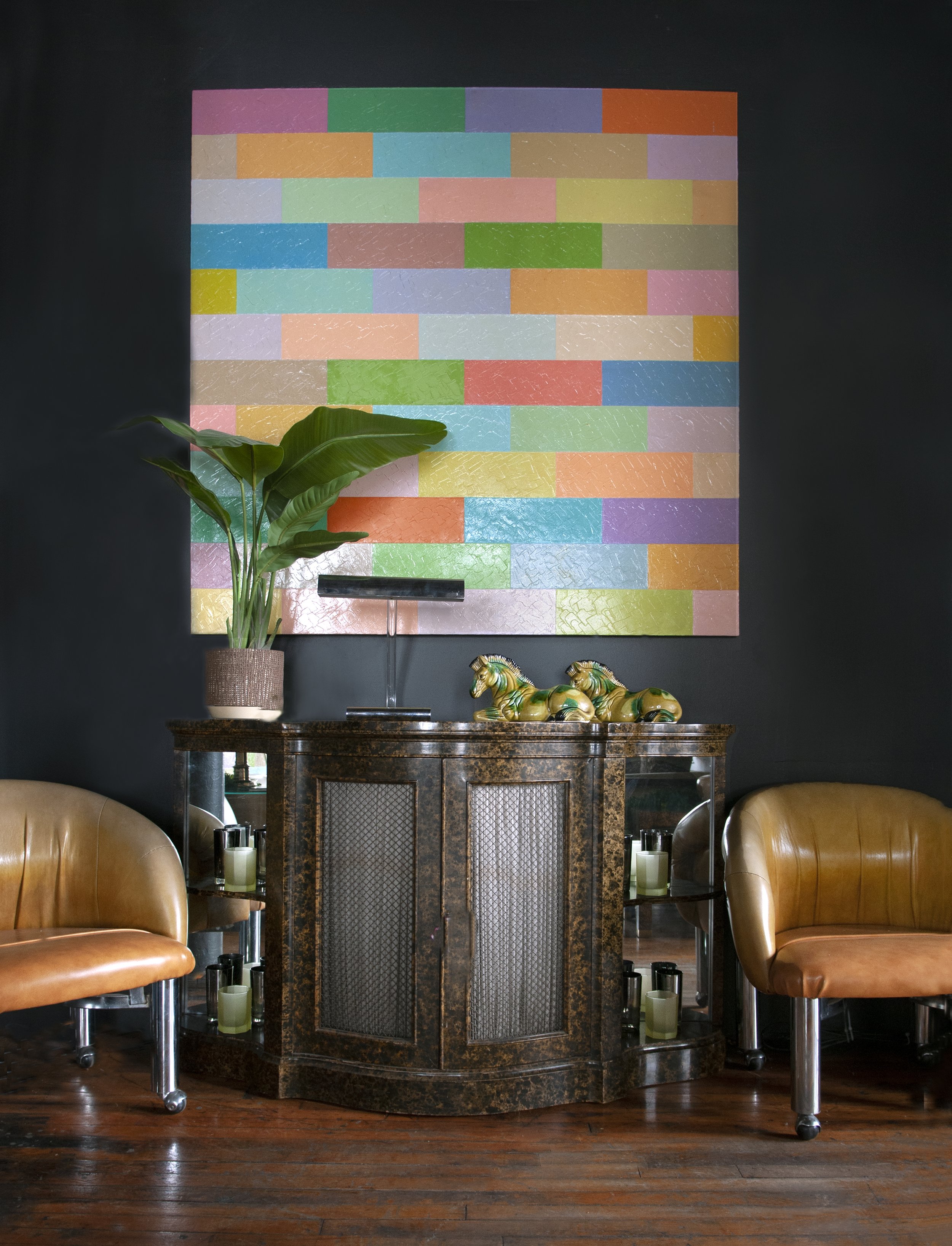 House of No Era's former historic loft studio in Camp Washington, Cincinnati, featuring a pair of 2008 IKEA Knappa Tulpan lamps by Flemming Brylle and Preben Jacobsen, Milo Baughman lounge chairs on casters, a large Mastercraft-style demi-lune cabine