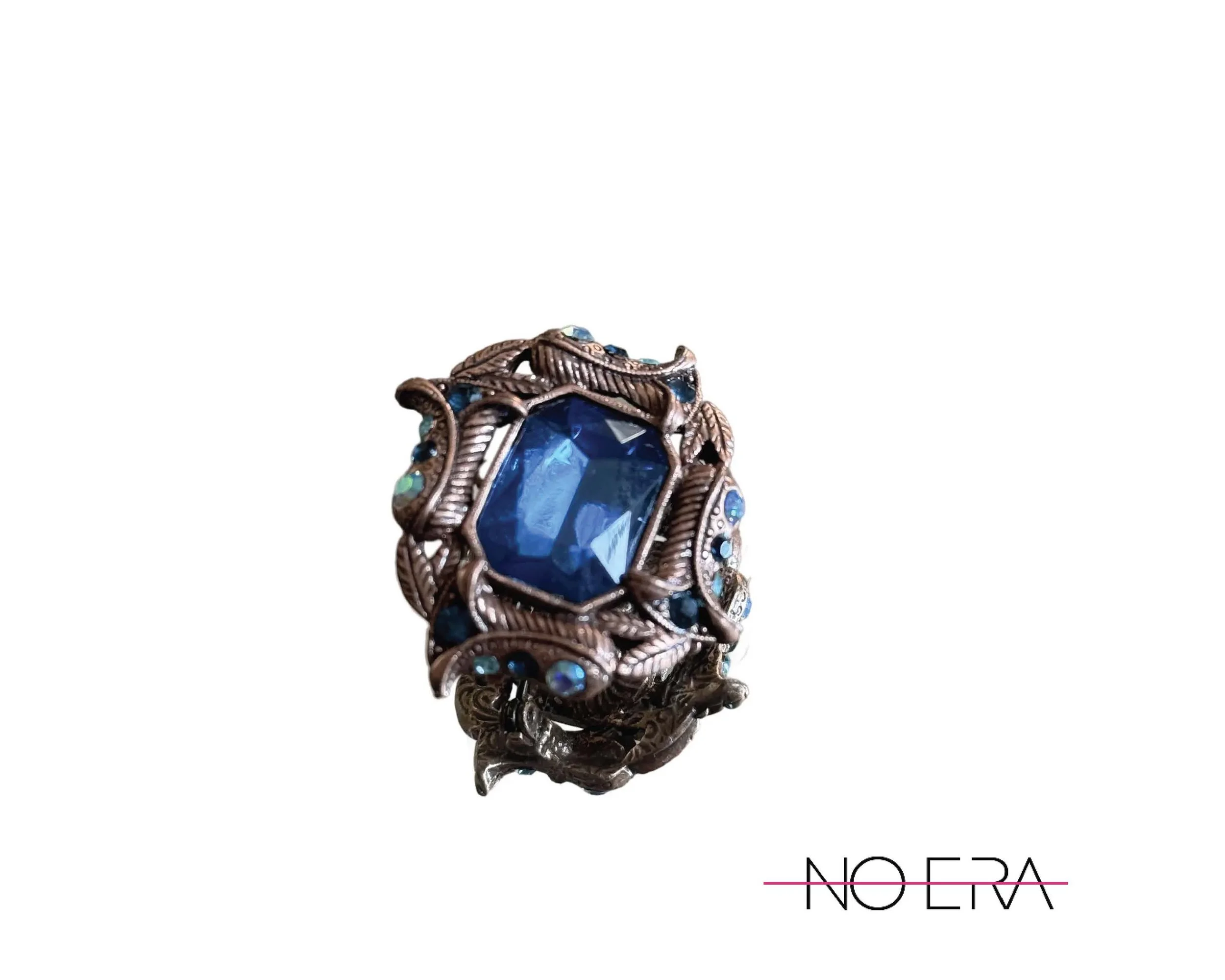 1970s-hollywood-regency-brooch-with-tanzanite-rhinestones-4291.jpg