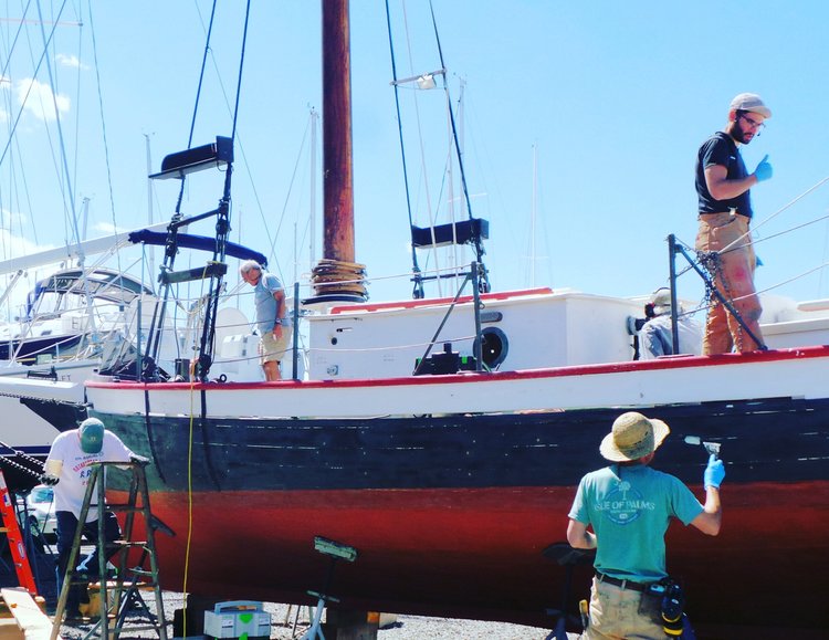 Volunteers refurbishing CHRISTEEN