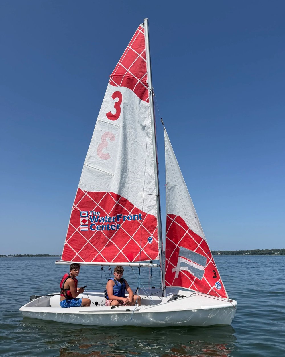 Red C420 sailing dinghy at The WaterFront Center