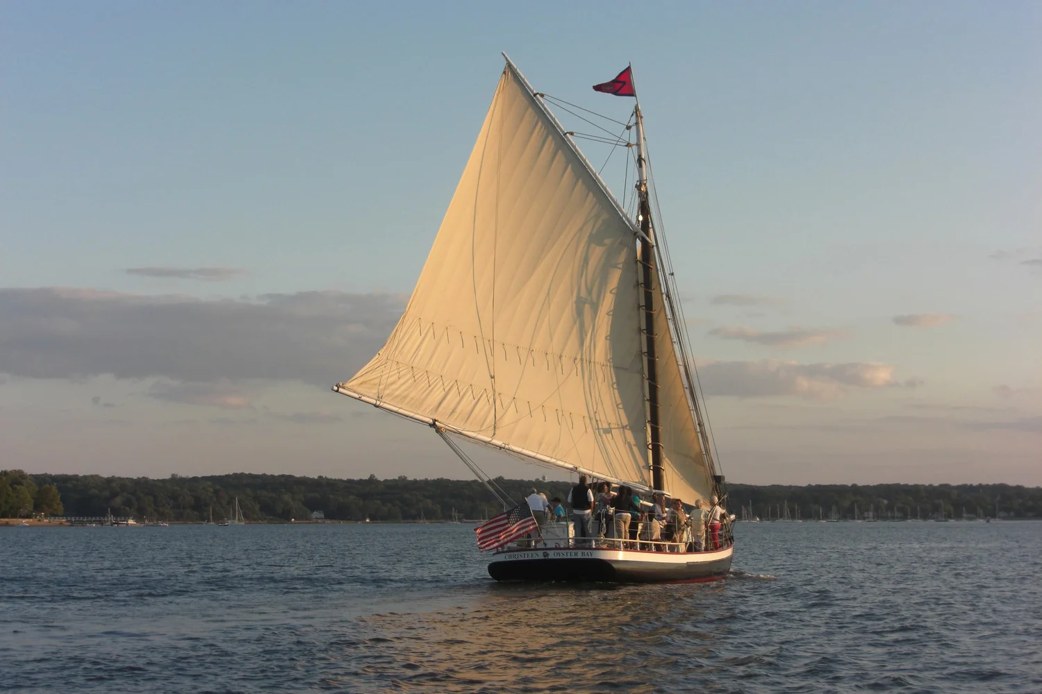 CHRISTEEN sailing on Oyster Bay Harbor at sunset