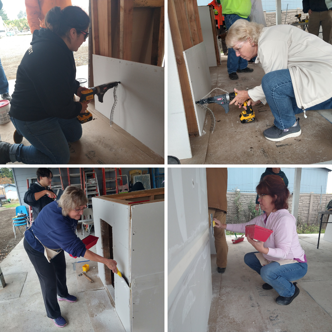Volunteers train with drywall to prep for helping at Countryman Estates