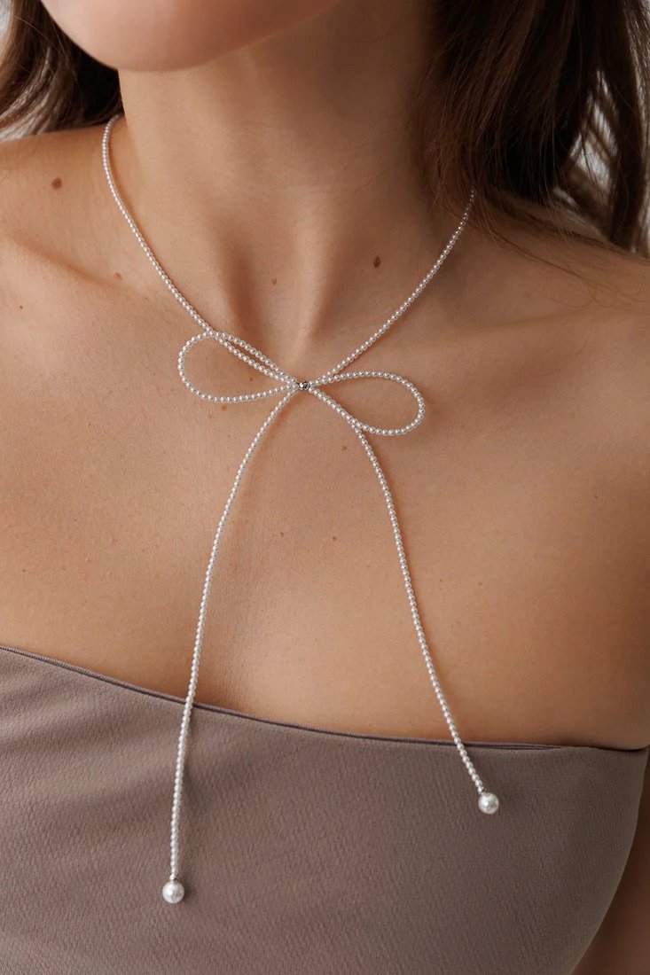 Limlim-Side-Bow-Lariat-Crystal-Necklace-pearly-white.jpeg
