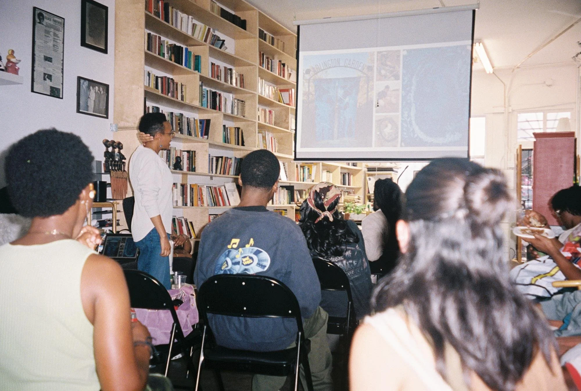 Schessa Garbutt lecturing about the history of cyanotype and its use by contemporary artists. Photo by Marvin James for Its-in-Scope.