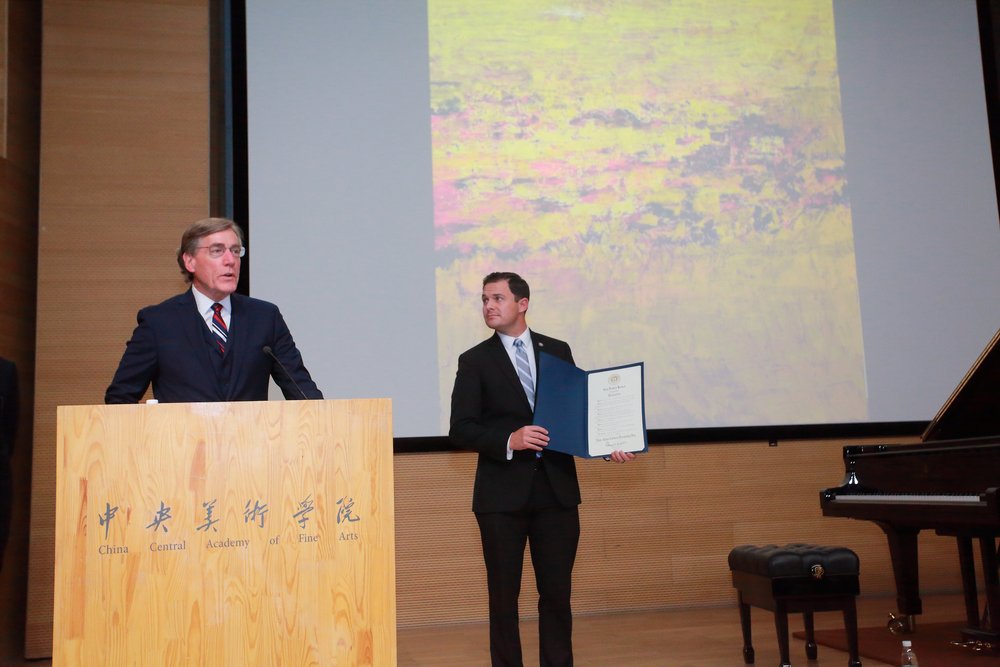 Brad Herbert presents the declaration of Utah-China Cultural Friendship Day alongside A. Scott Anderson