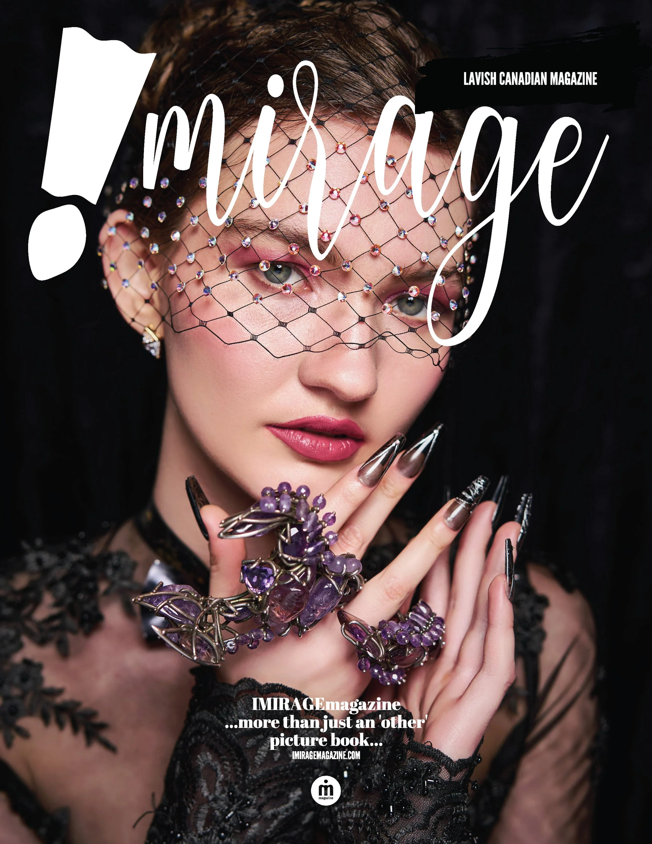 A woman with pale skin and light makeup wearing a black lace outfit, jewelry with purple gemstones, and a decorative netted veil over her face, posing for a fashion magazine cover.