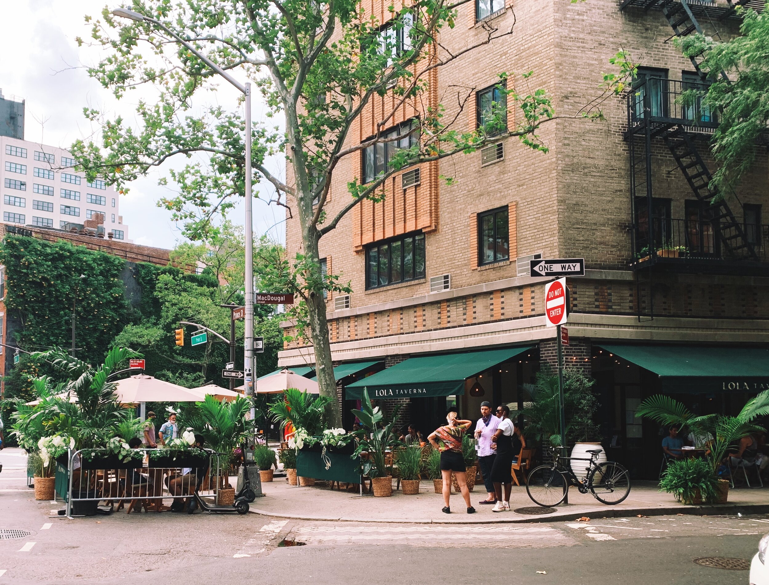 Another little private oasis in the West Village under the palms and cover of umbrellas - Lola Taverna is taking reservations on Resy!