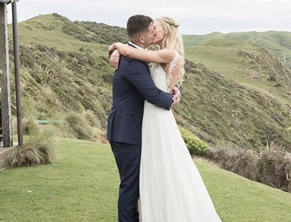 Katrina and her husband Joel on their wedding day