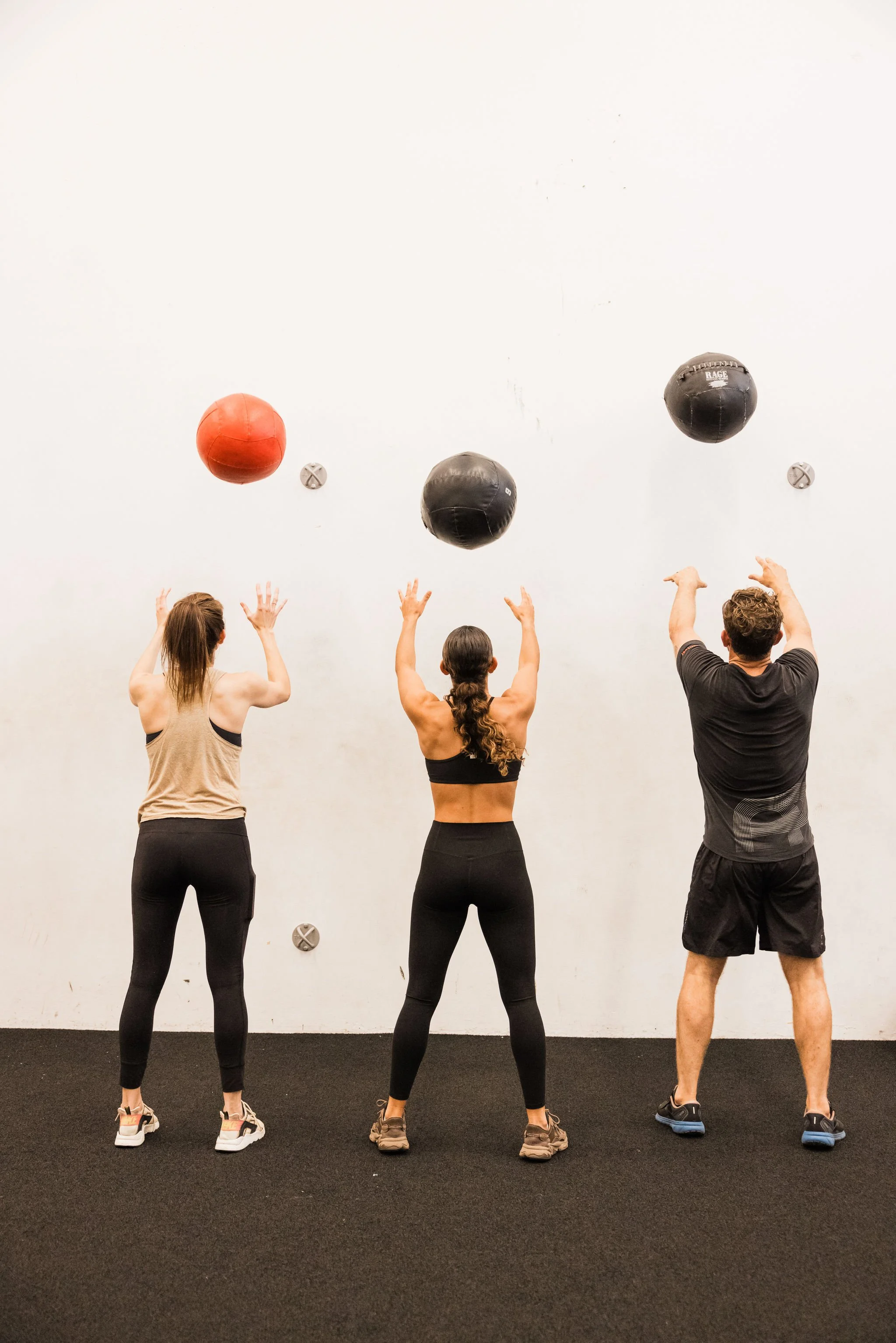 Members working on strength, mobility and movement quality during an Asteya FIT class