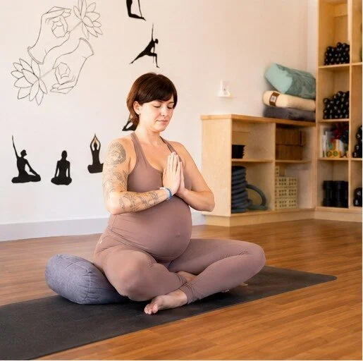 Student at Asteya Collective Prenatal Yoga Class
