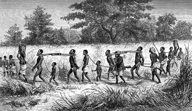 Slave traders and their captives bound in chains and collared with 'taming sticks'. From Livingstone's 'Narrative of an Expedition to the Zambezi'