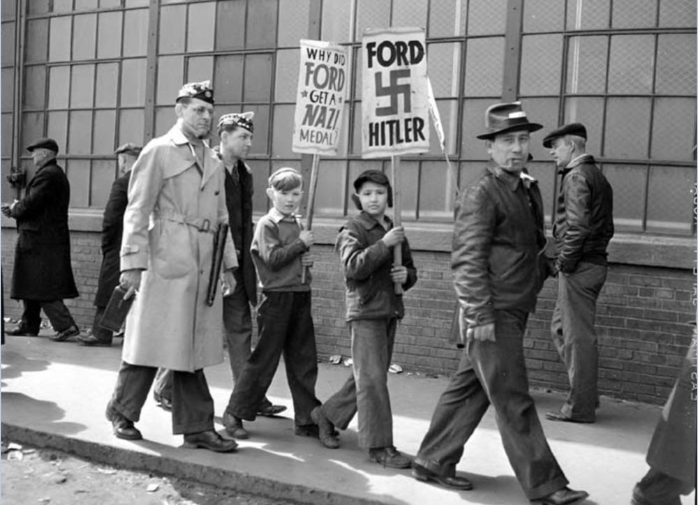 Strike at Ford River Rouge Plant 1941, workers and their children compare Ford to Hitler