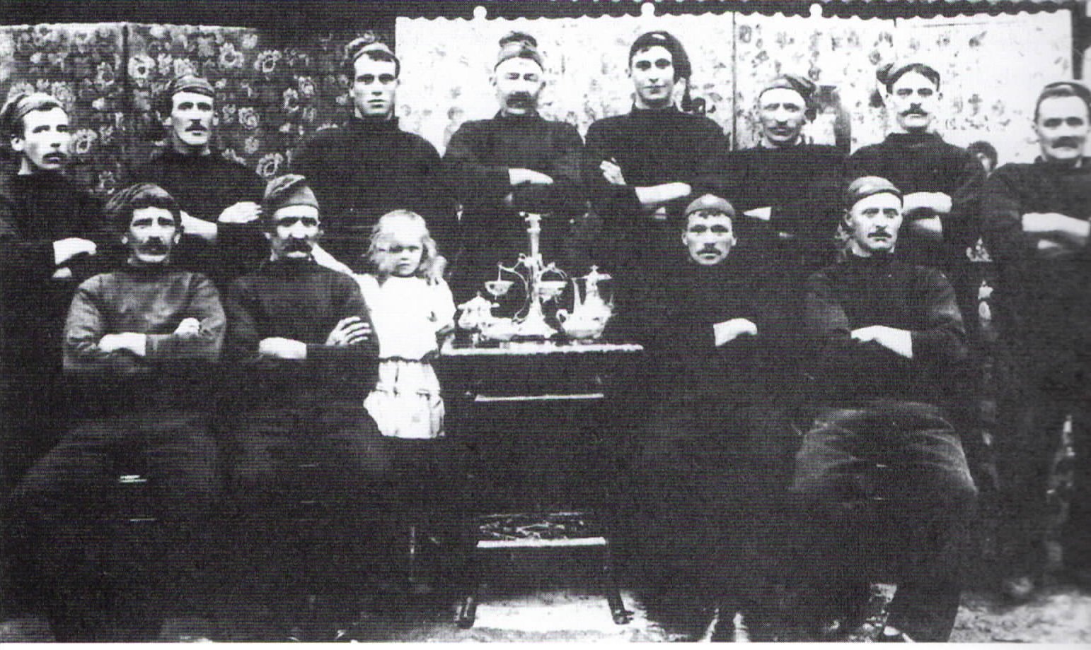 Trawlermen displaying cups won in Regatta 1