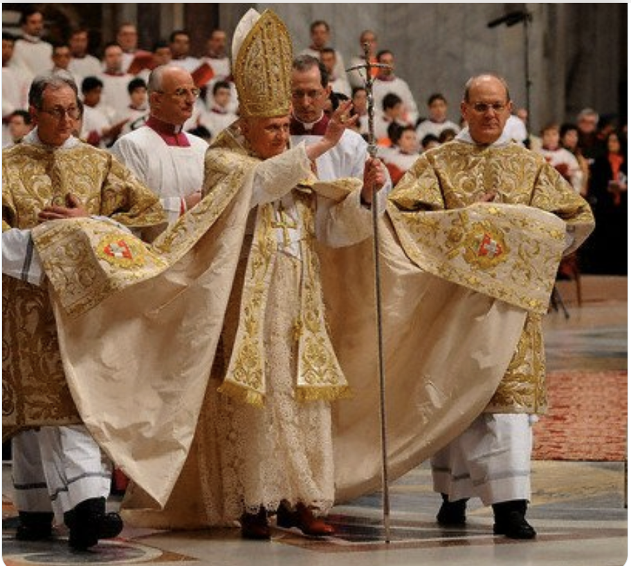Pope Benedict XVI (Ratizinger) with his coats of arms on 4th Century style vestments along with lace and red shoes