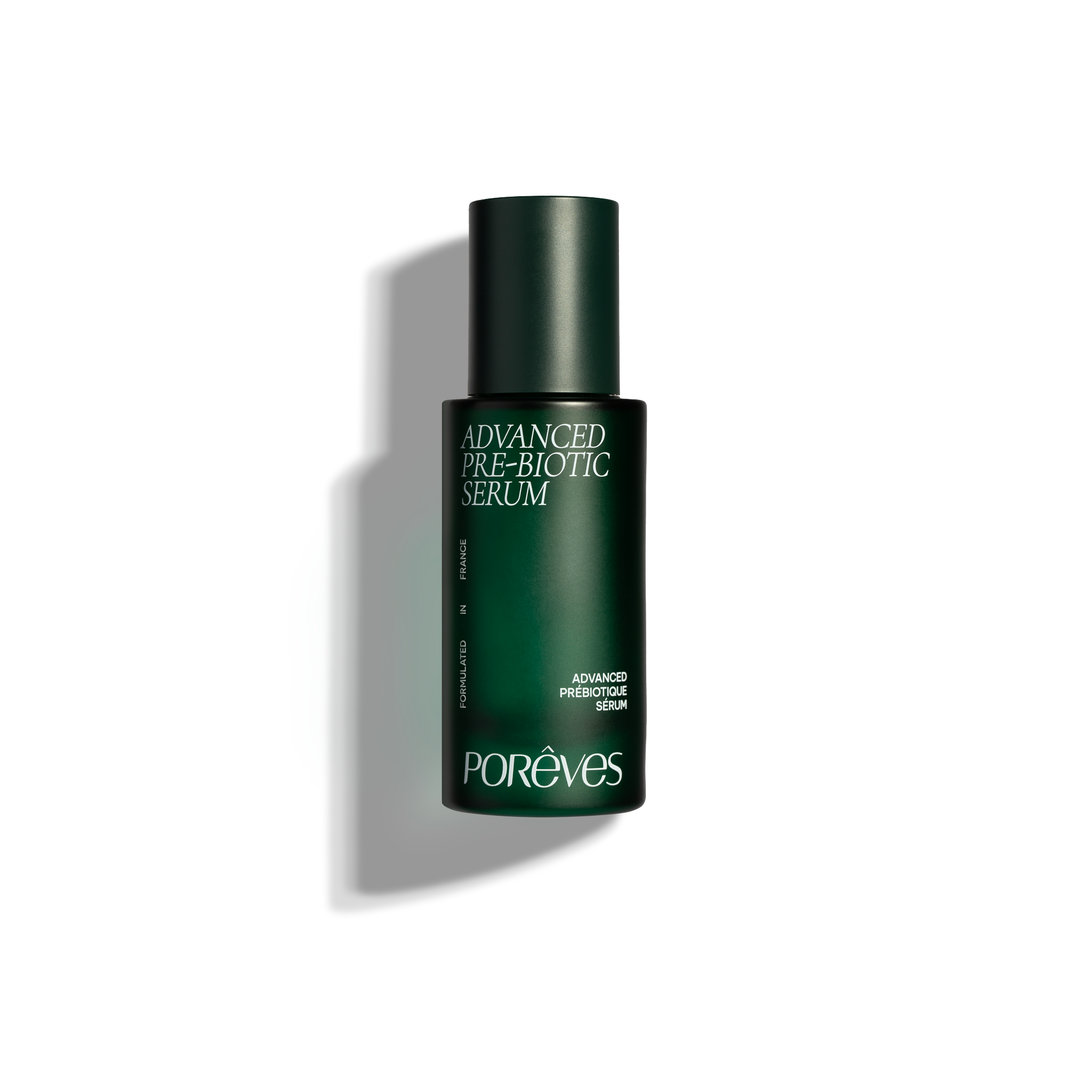 A dark green bottle labeled 'Advanced Pre-Biotic Serum' with a gray shadow on a white background.