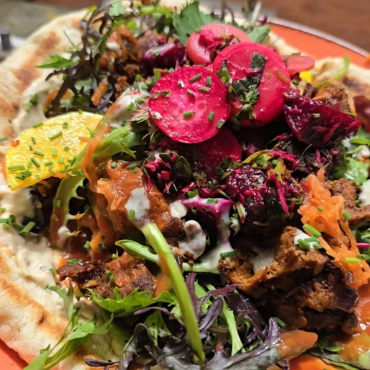 Spicy seitan special today on flatbread! Roasted beets, horseradish, garlic, herbs, yoghurt....y'all know it's good, local, fresh, and perfectly seitanic. Don't panic, we're open til 5.
