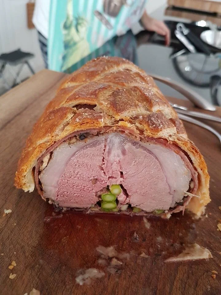 Lamb Wellington stuffed with fresh Asparagus