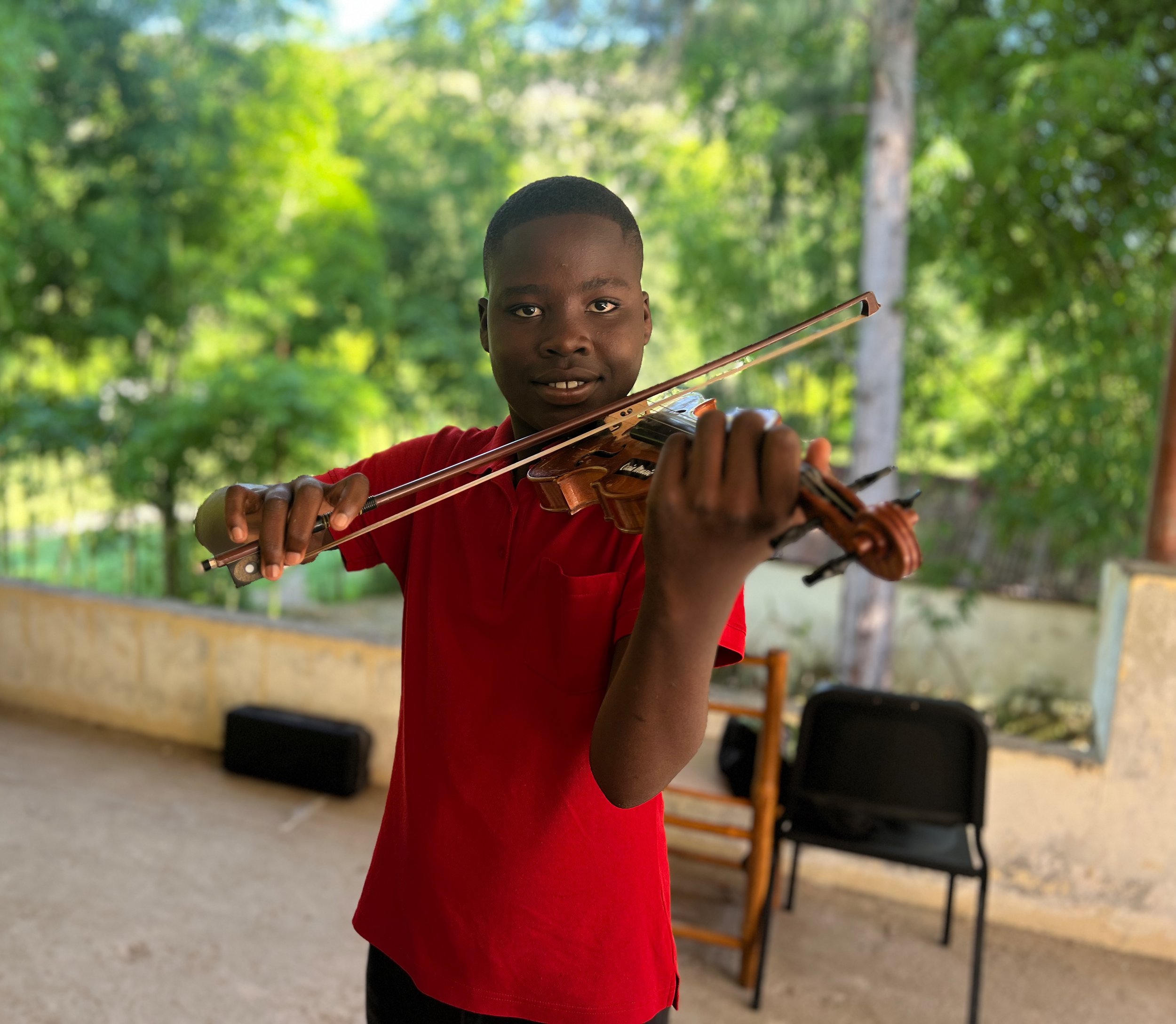 Camp Marmelade young violinist boy.jpg