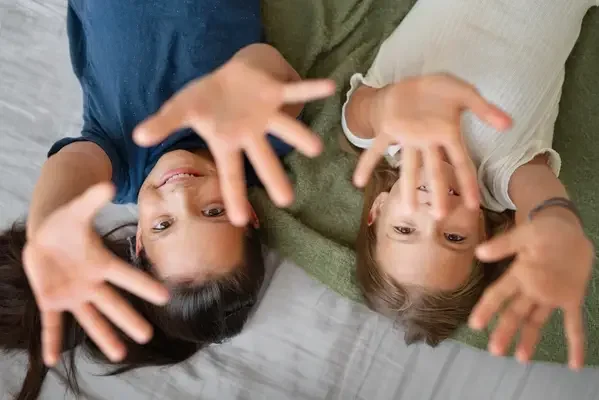 Kids lay down at the floor