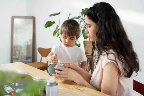 Mother teaching her child about recycling materials