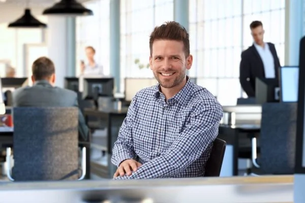 Man smiling and wants to claim for professional success