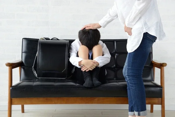 A mother encouraging her child with ADHD.