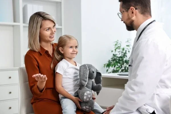 Parent talking with doctor about alternatives