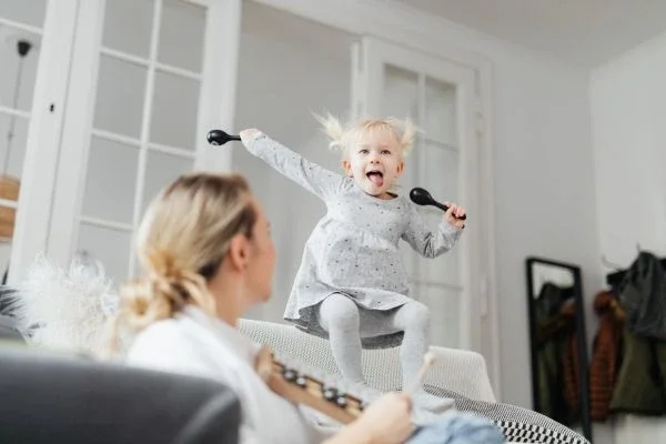 Child showing signs of hyperactive behaviour