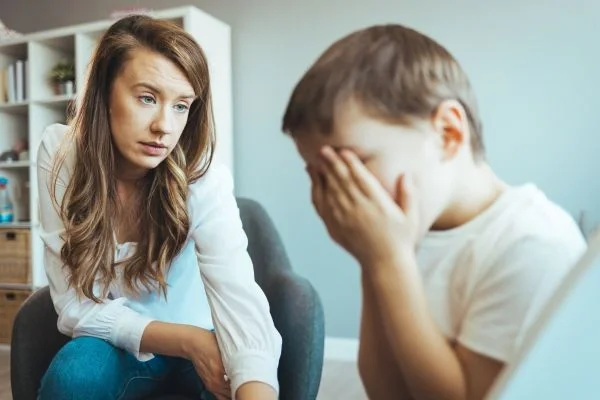 Parent helping child manage emotions gently