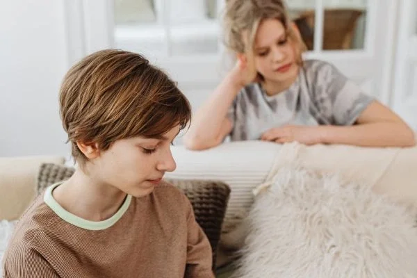 Parent guiding ADHD child through tasks