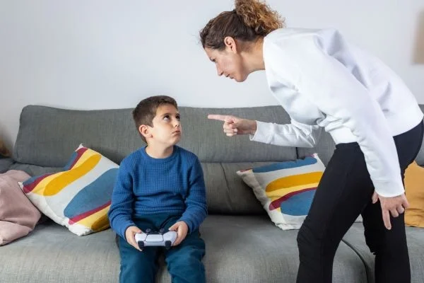 Parent disciplining child for inappropriate behavior