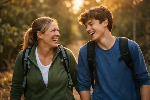 Parent and ADHD teen hiking together building positive relationship