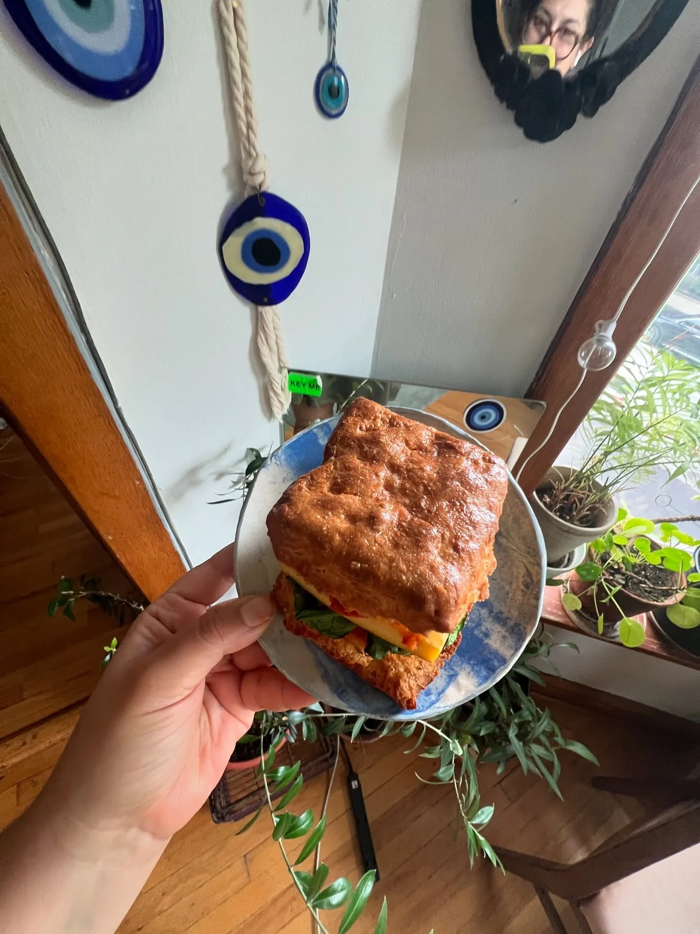 I just need everyone to know I got @notasweetsperson &lsquo;s breakfast sandwich from @cafeyaya_chi and it looked really quite at home on my blue marbled plates so I took about 700 pictures and then very ungracefully went to town on that thang. MARY 