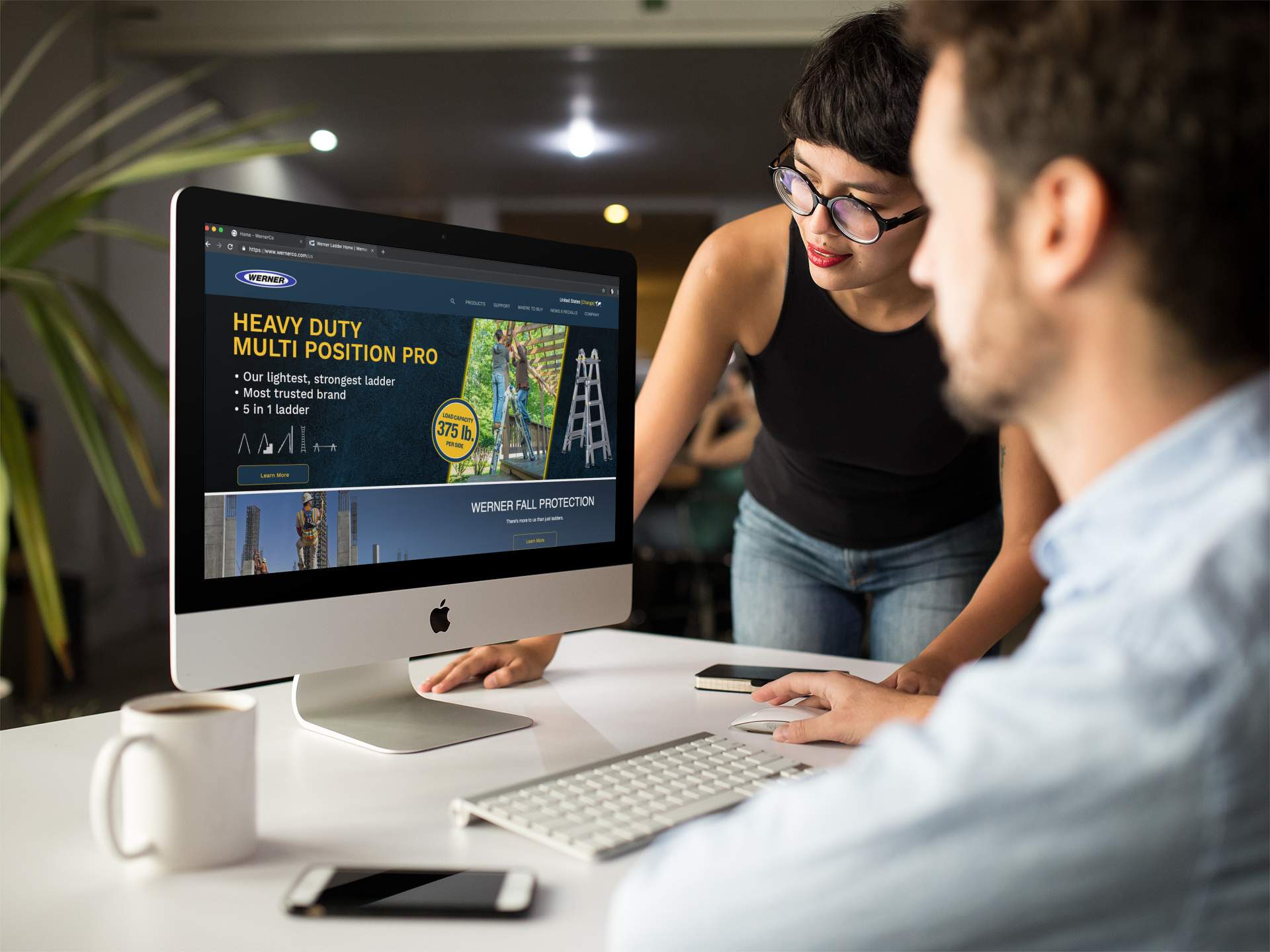 girl-showing-something-in-imac-mockup-to-coworker-a16266.png