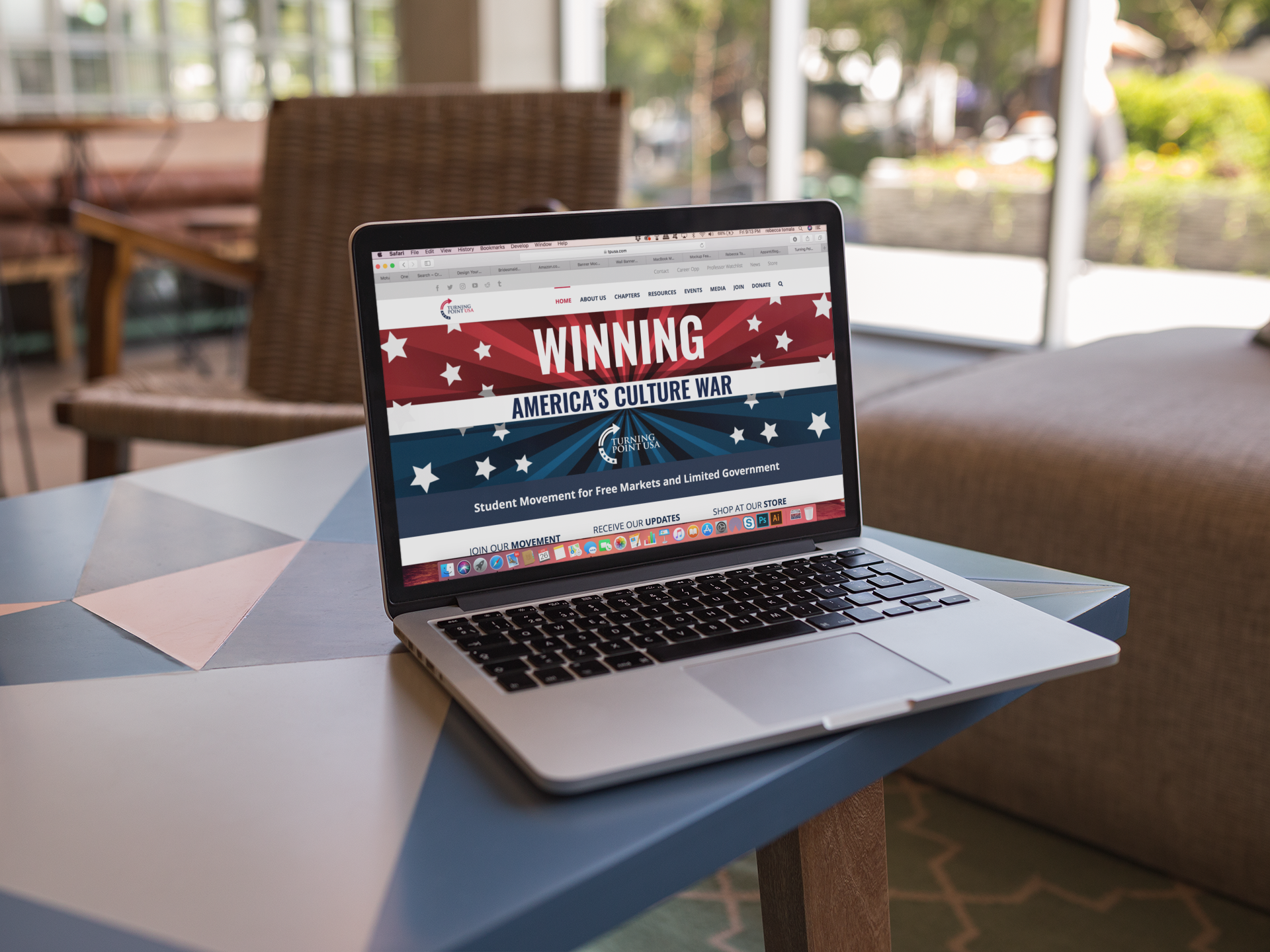 mockup-featuring-a-macbook-standing-on-the-border-of-a-small-table-a21509.png