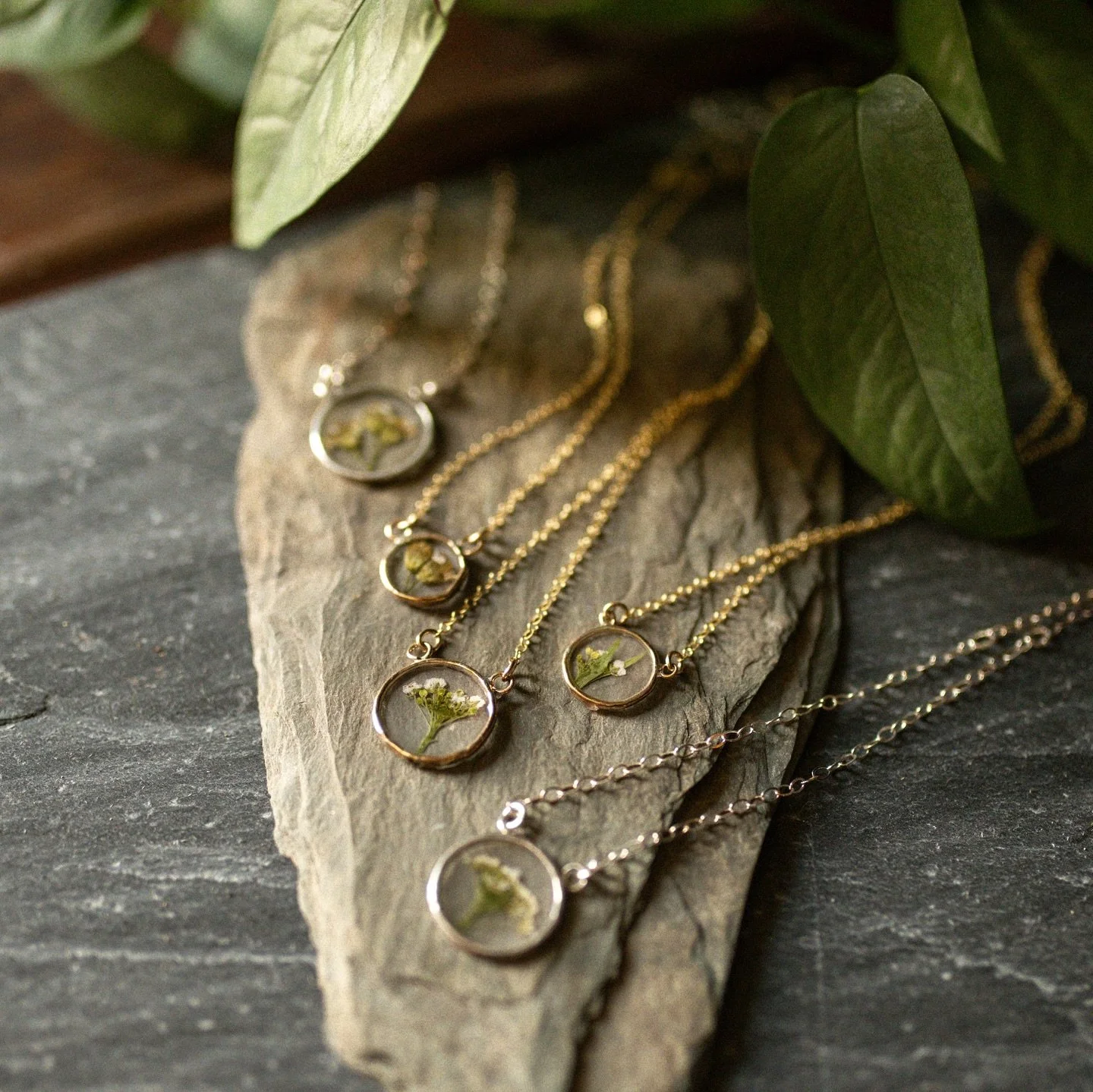Consider the Flowers | Wildflower Pendants✨ 
I adore these sweet little necklaces&mdash;each wildflower, carefully preserved within its metal setting, feels like a tiny window into the beauty of God&rsquo;s creation. ✨ A reminder that His handiwork i