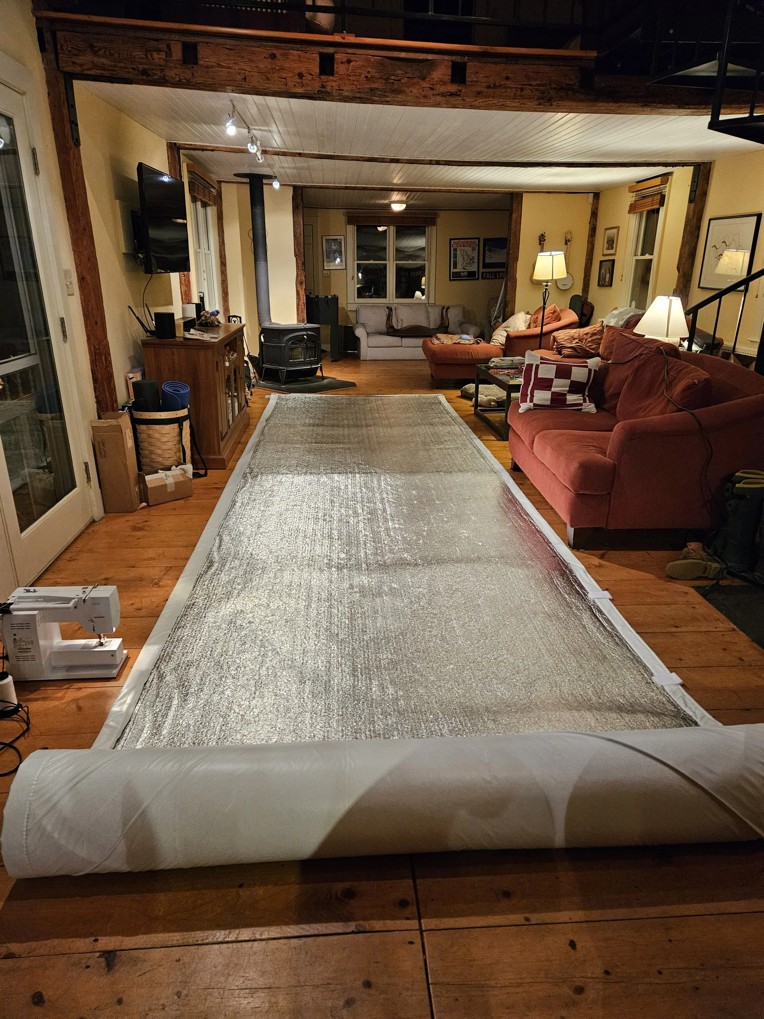Sewing up the side wall insulation and blackout fabric.