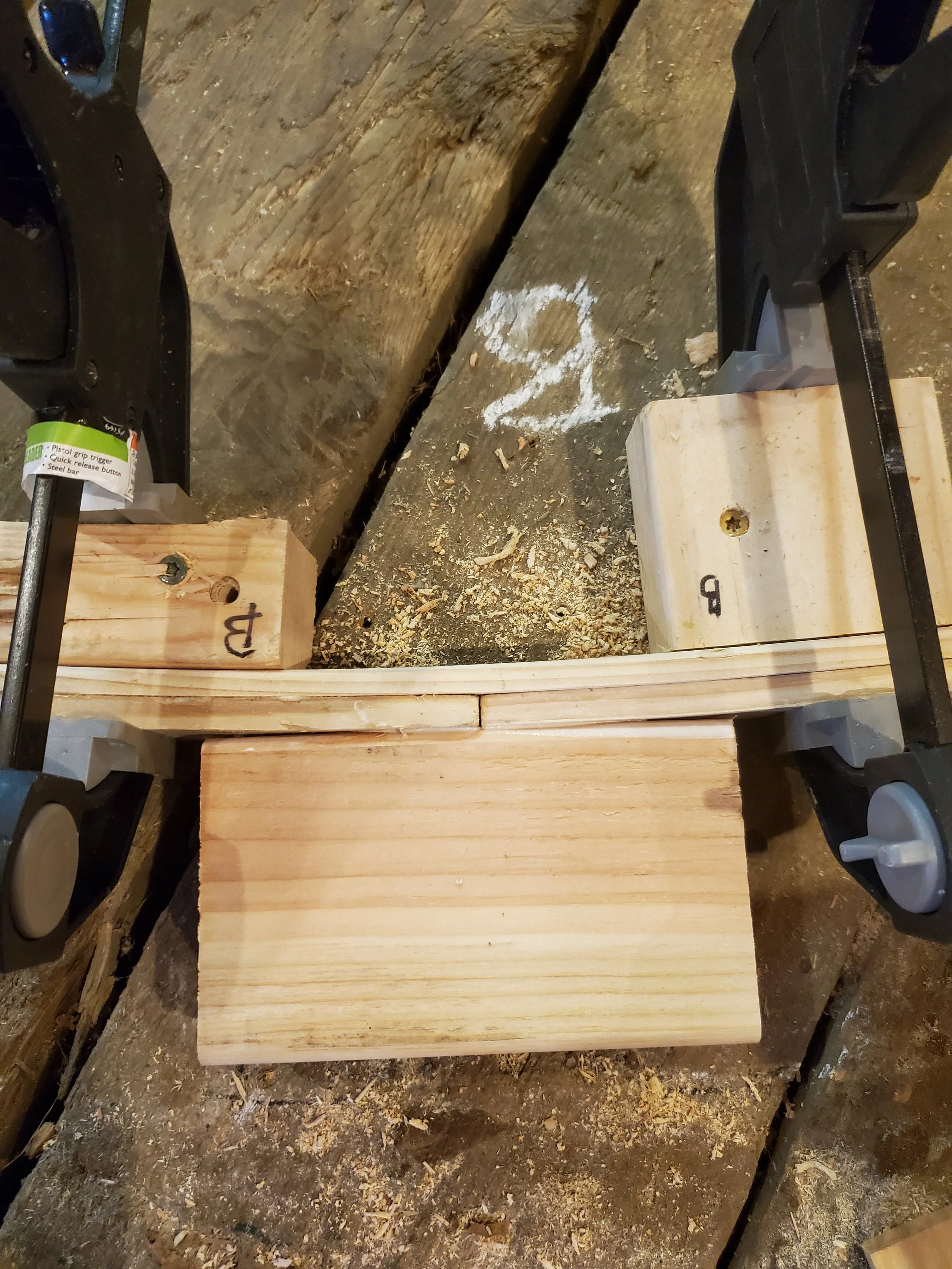 Ensuring that the butt-end joints of the laminations are supported by the frame and offset between lamination layers