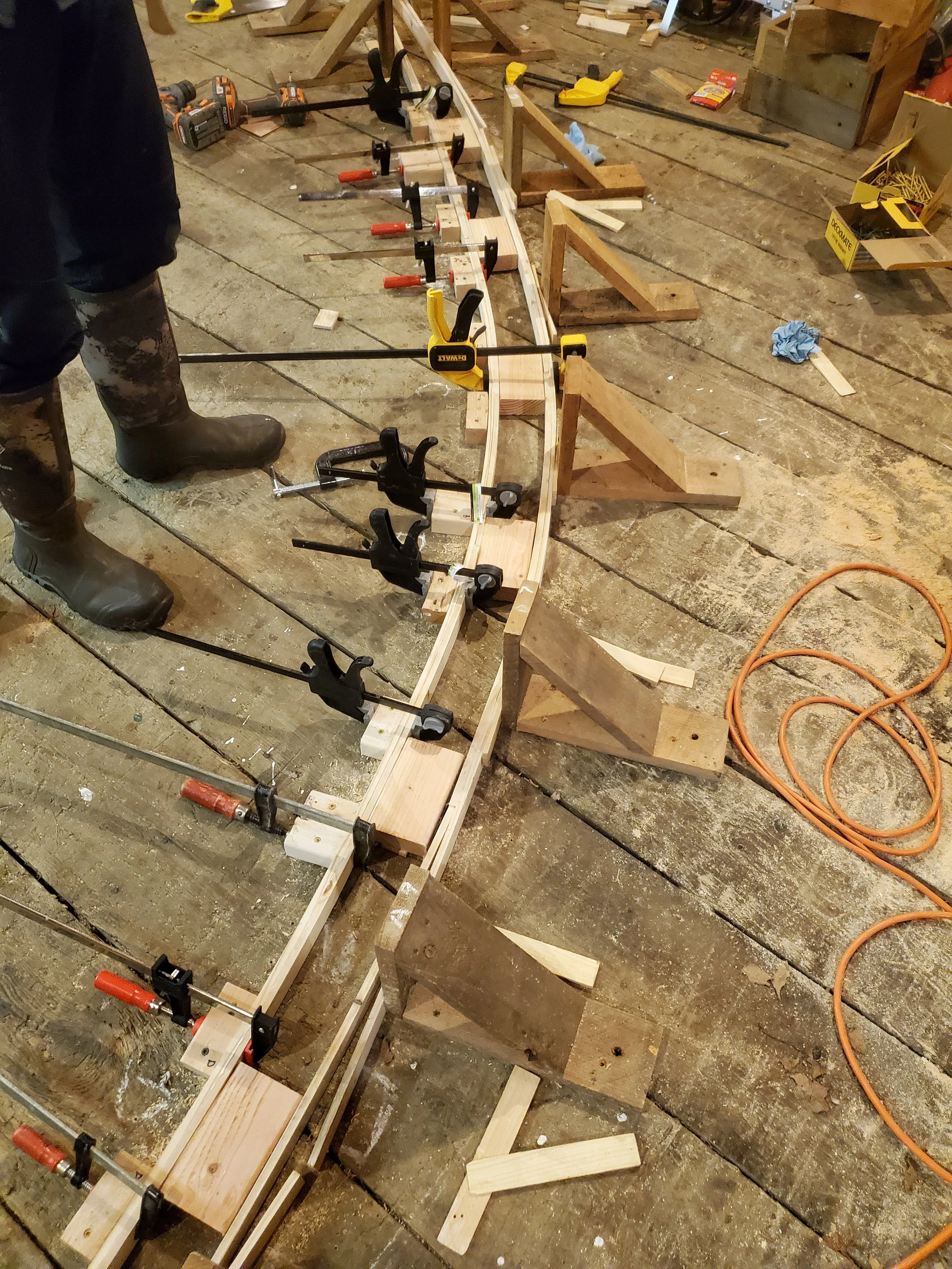 Outer lamination is attached to the rib assembly