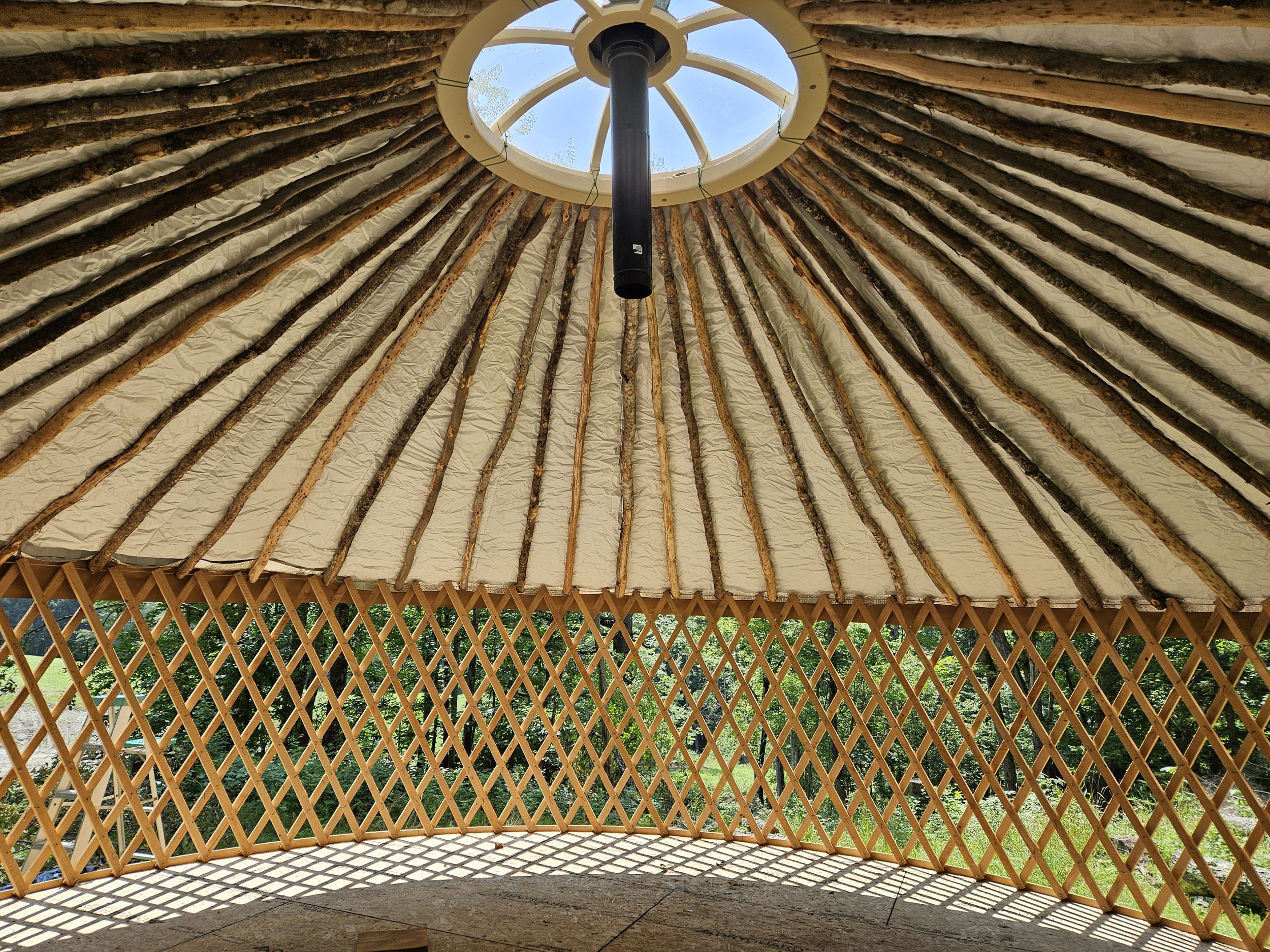 Roof cover installed. On to the side wall.