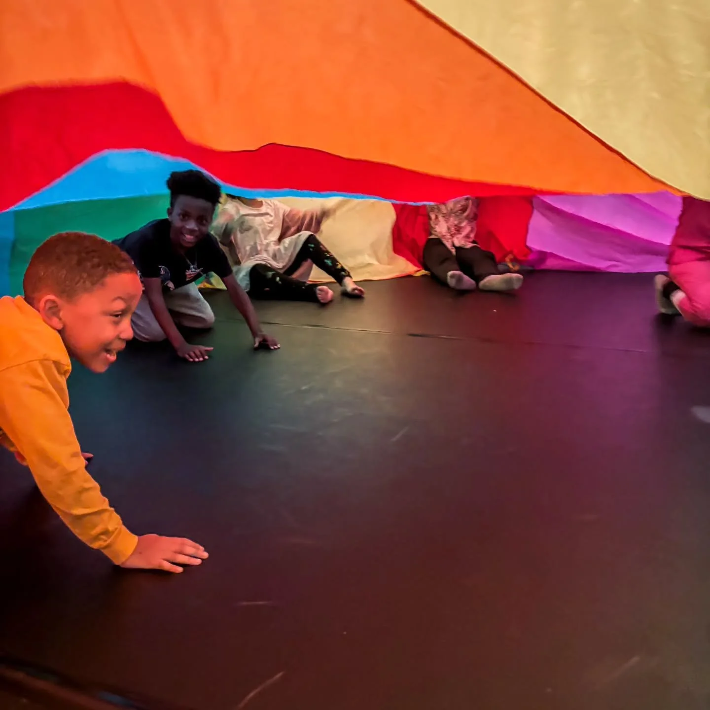 It might look like just a game, but this is so much more. This is community. This is connection. This is healing in motion. 🌈

​Using tools like a parachute in group therapy sessions allows children to learn and grow together in a dynamic, joyful wa