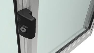 Sliding glass door with black handle and lock