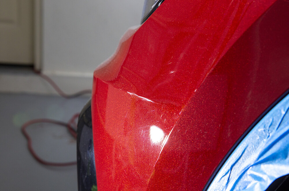 Fairly typical paintwork for a brand new car, with some minor swirls and marring from the dealership here and there.