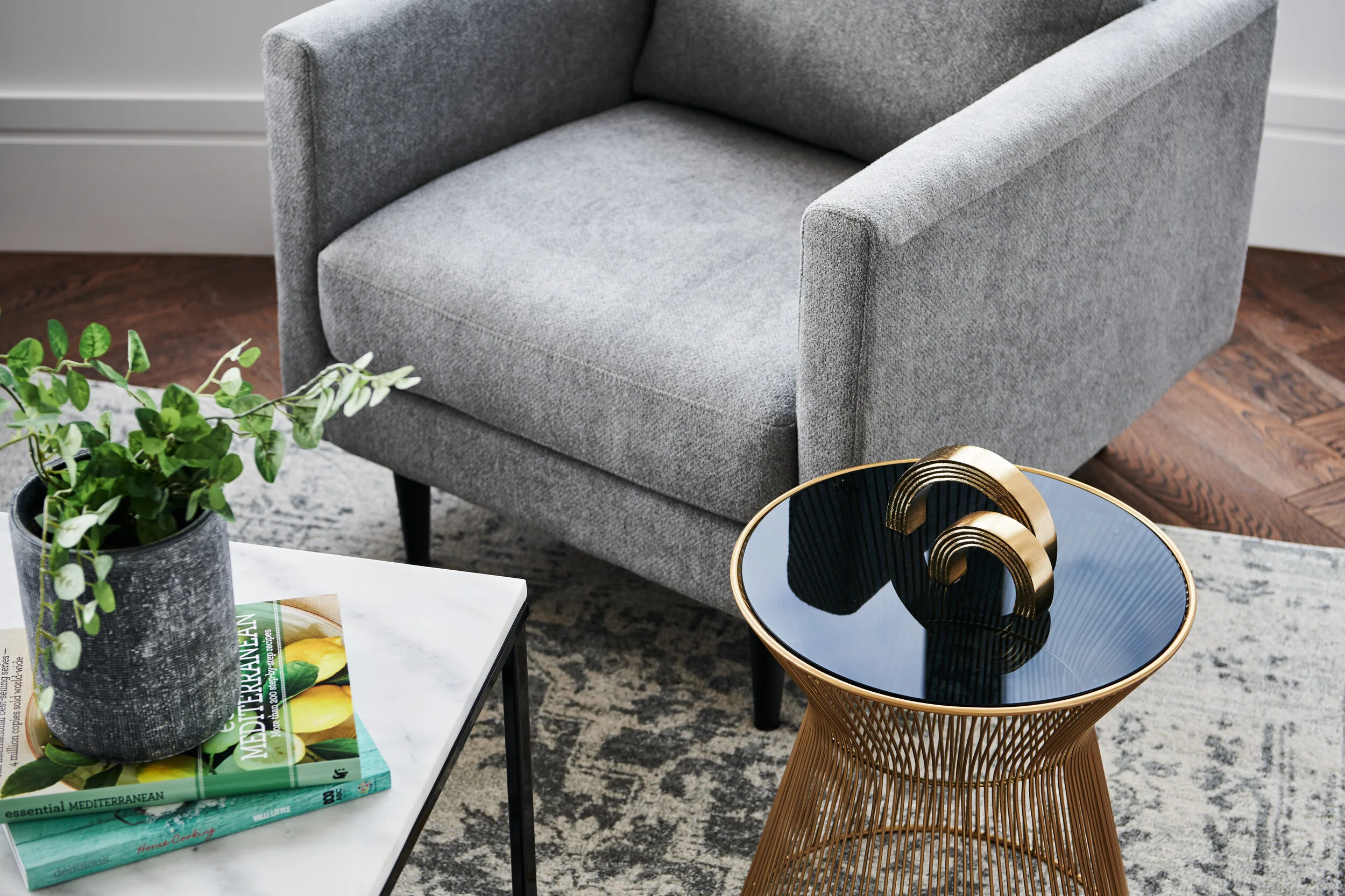 Coffee table vignetted - styling plants books