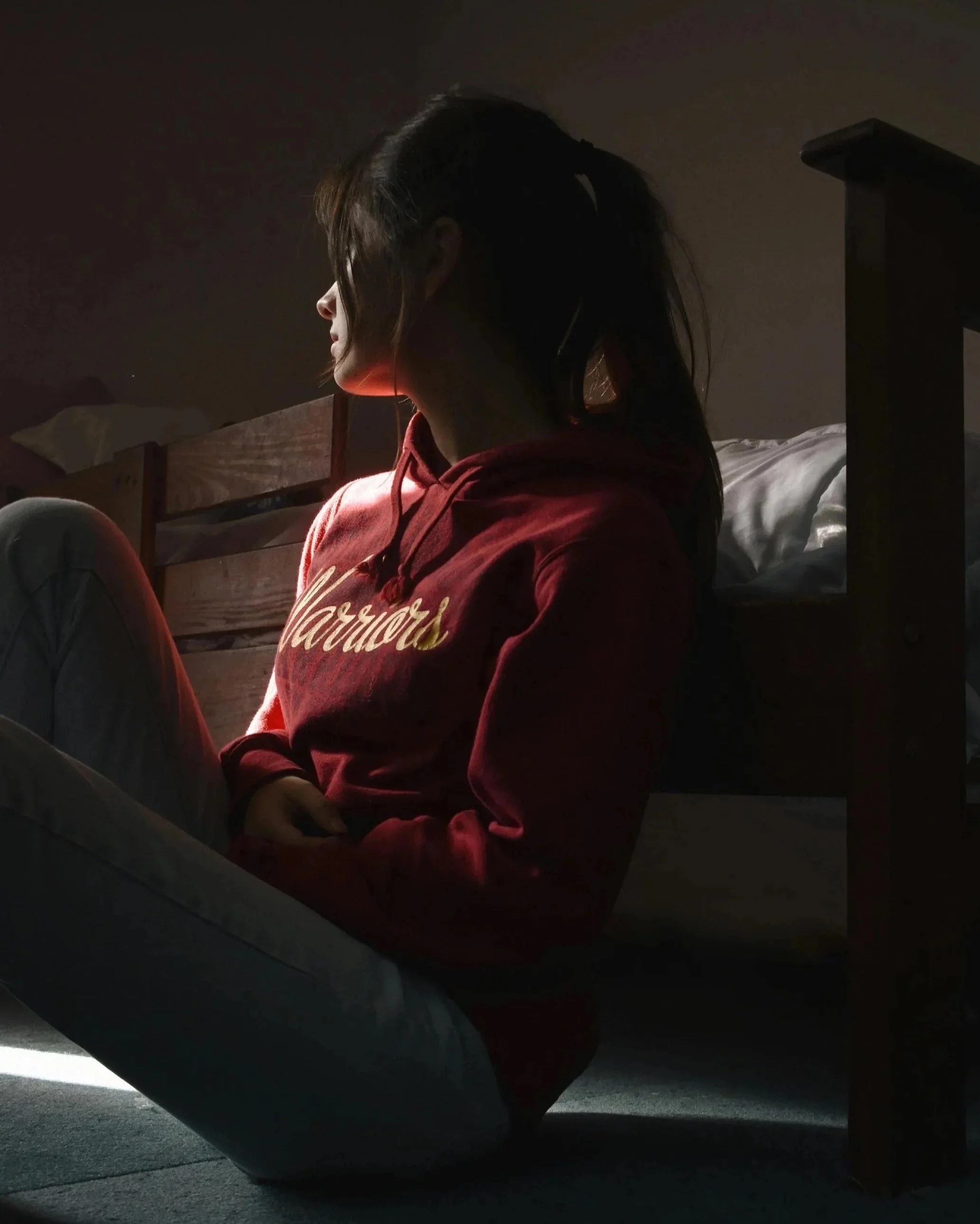 woman sitting steering in the distance